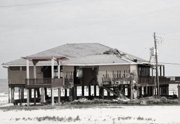 wind damage - spray foam can help prevent uplift to Juno roofs